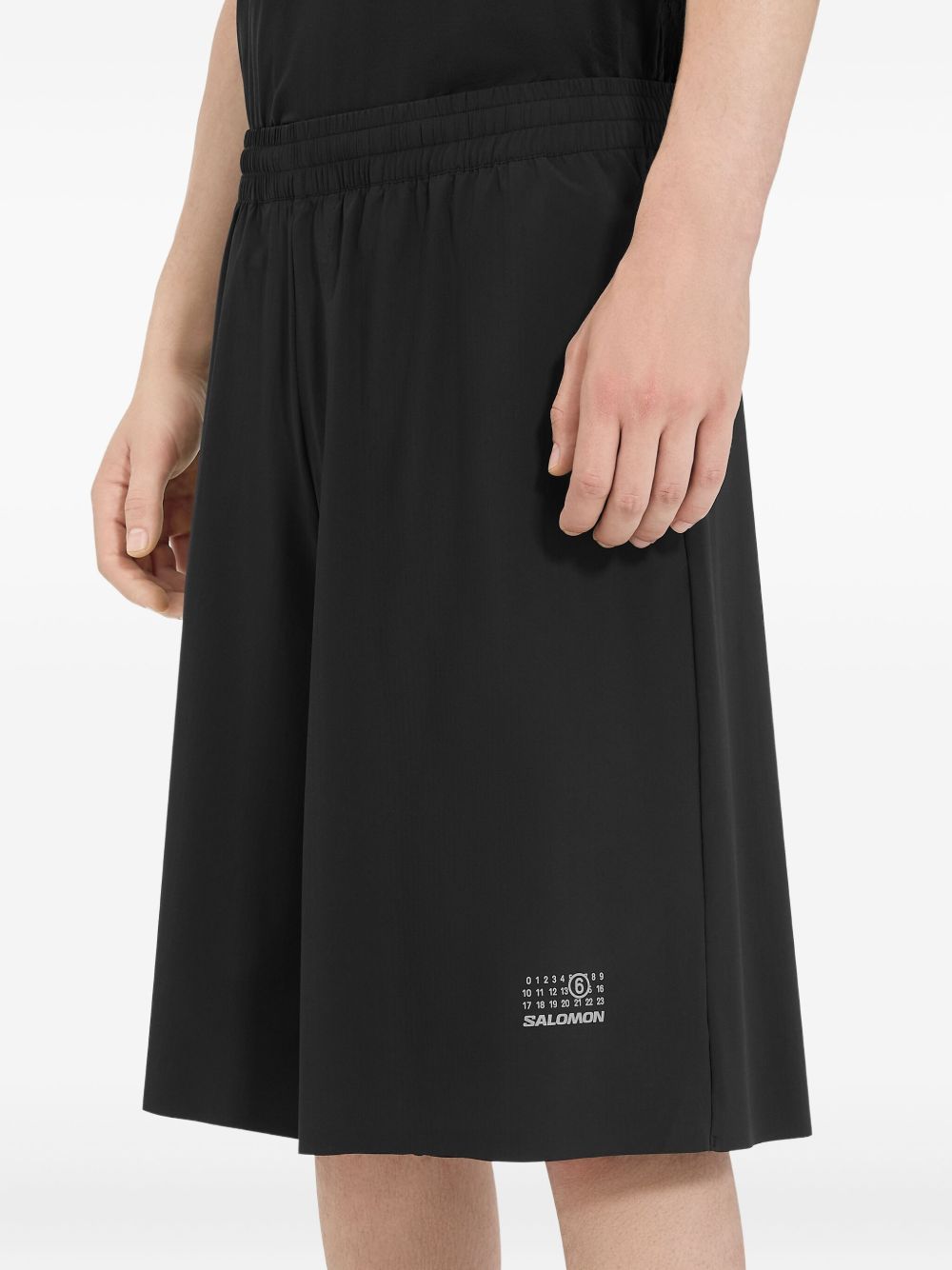 x Salomon numbers-print shorts