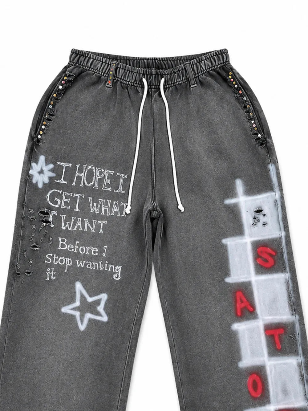 Get What I Want distressed graffiti-print trousers